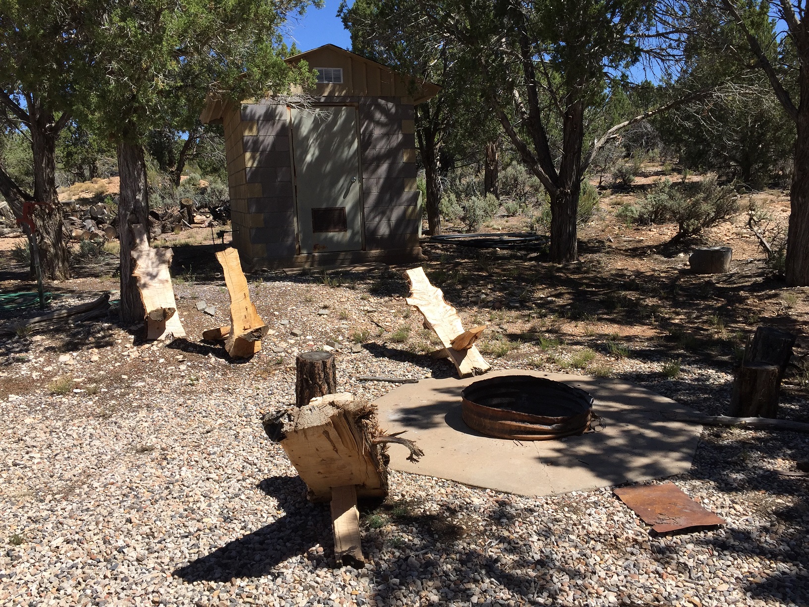 A firepit and makeshift chairs at the BLM Poverty Admin Site