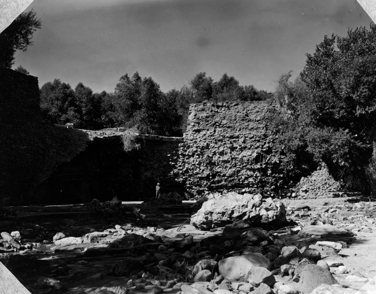 Downstream face of the Shem Dam spillway, showing the 1955 flood damage