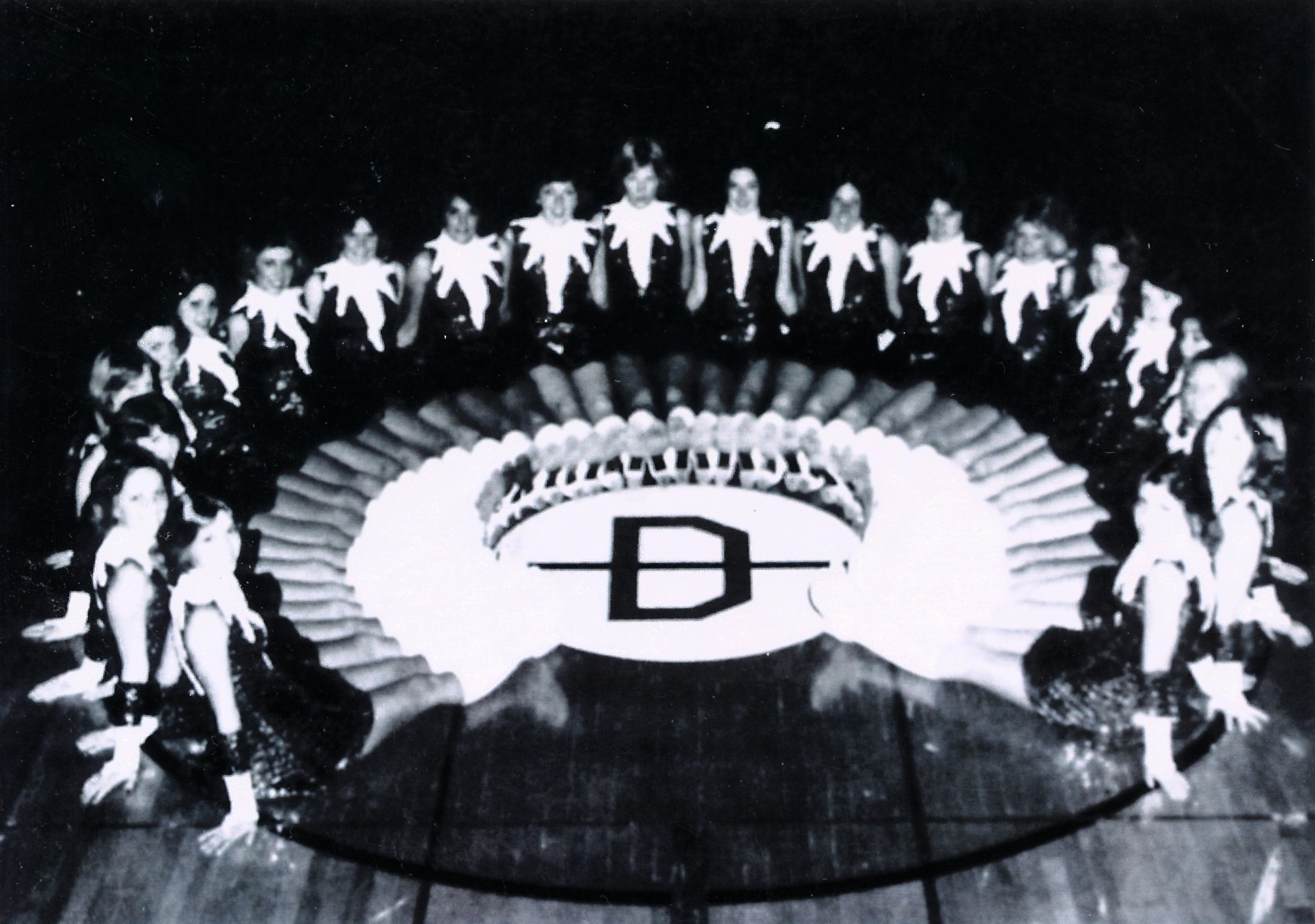 Dixie [Academy/High?] girls in costume and in a circular formation
