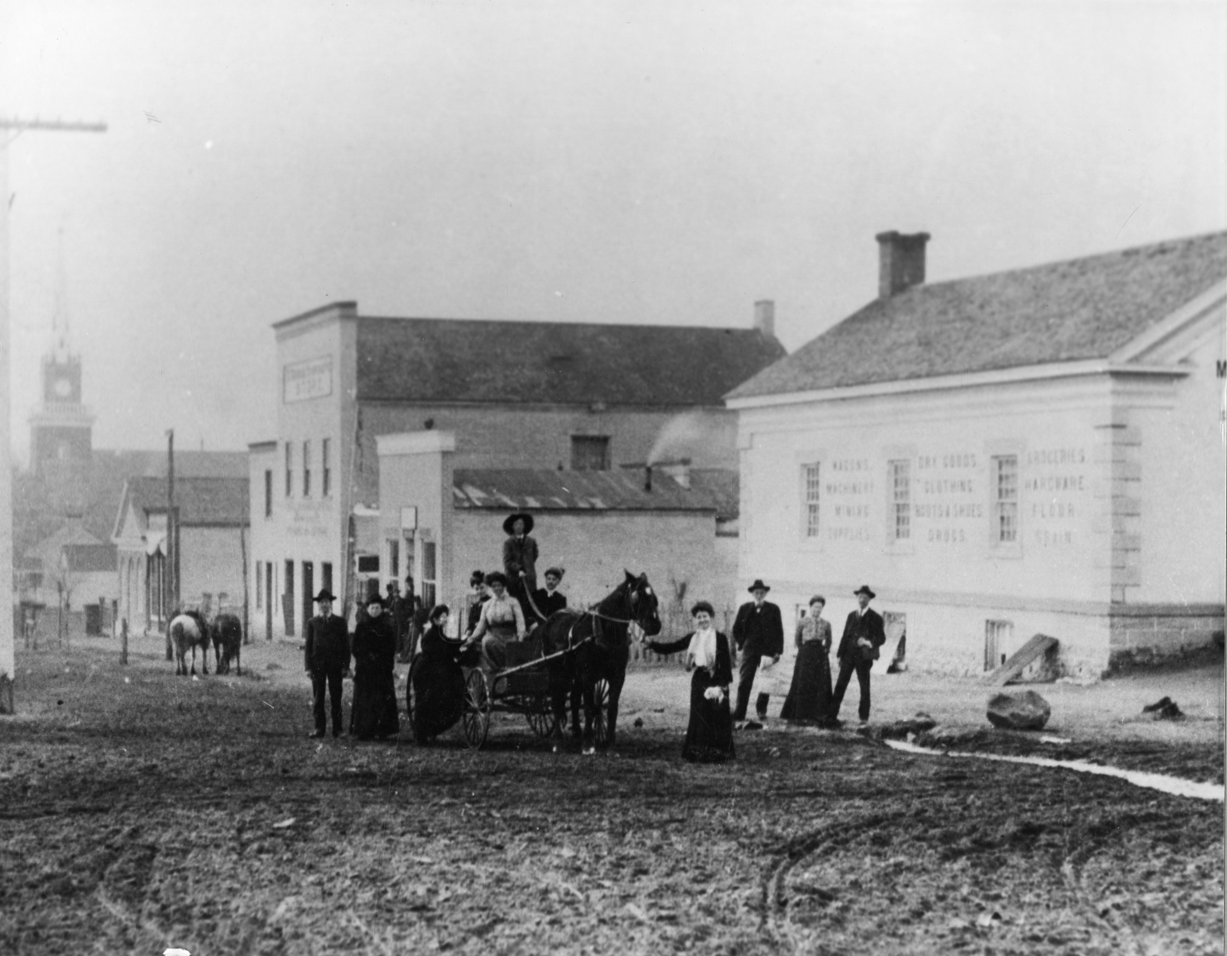 A wagon and people on Main Street just south of 100 North in St. George