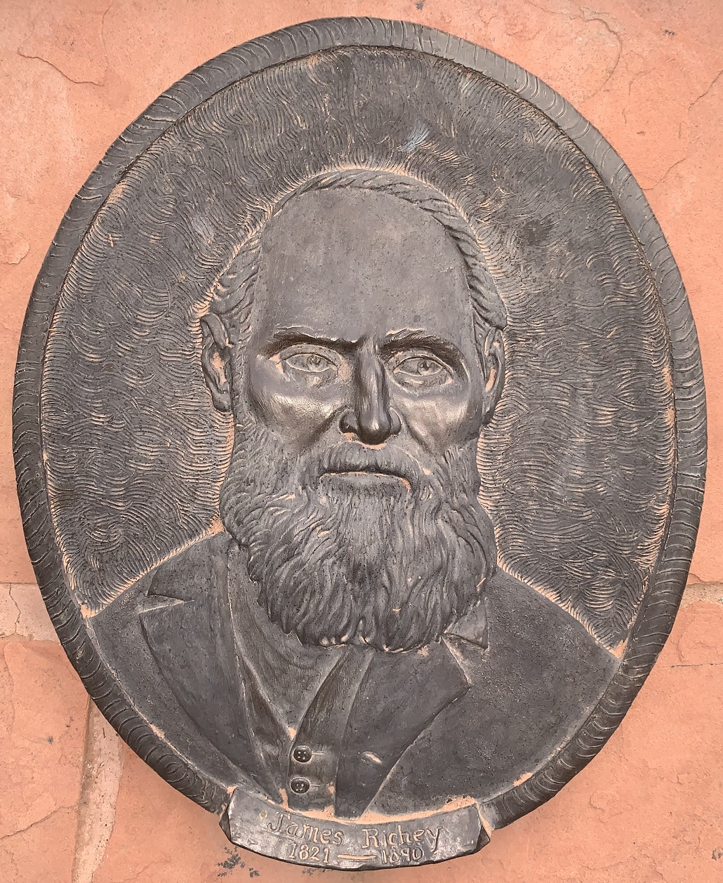 Face plaque of James Richey at the Monument Plaza in Washington, Utah