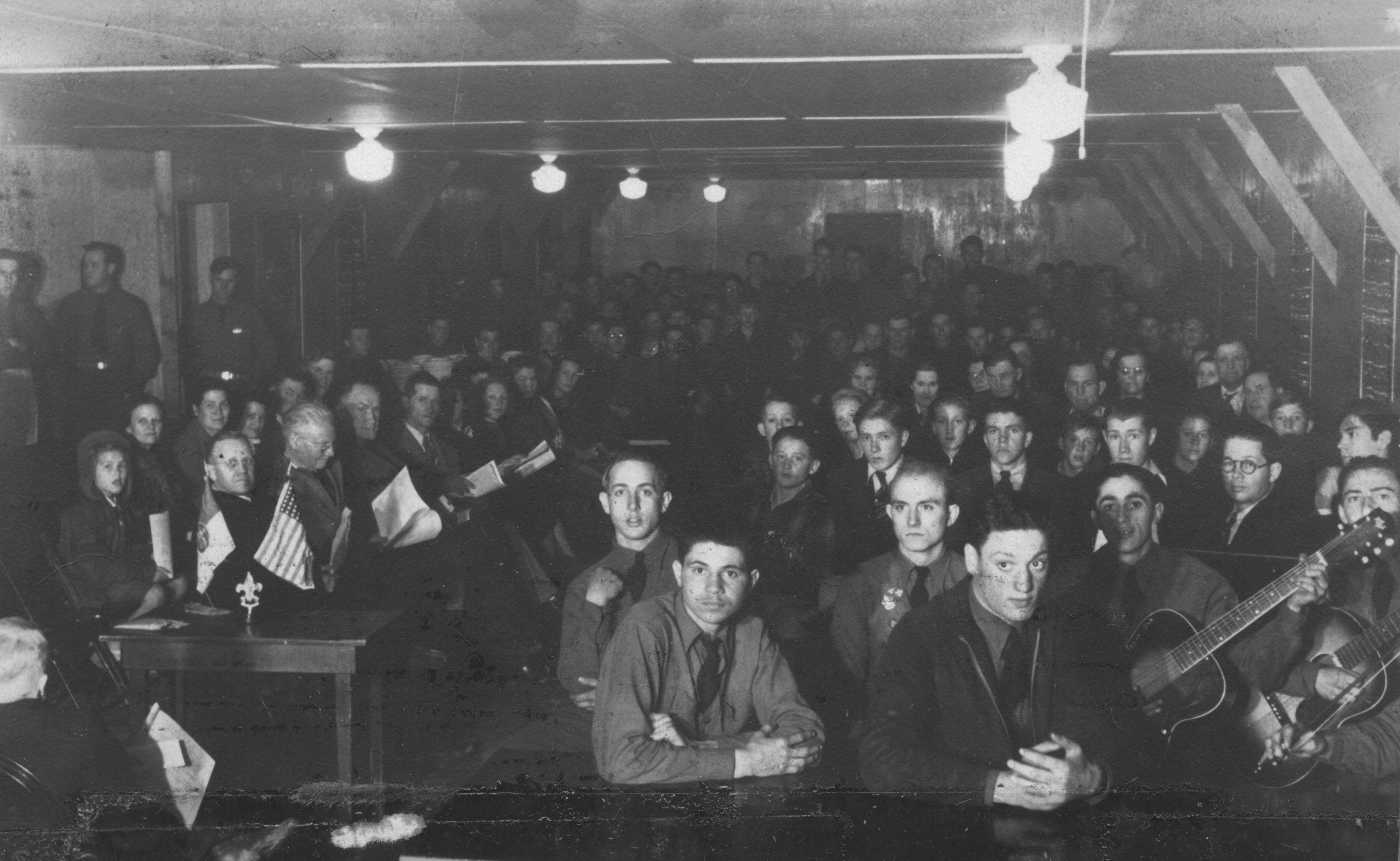 A gathering of enrollees in the recreation hall at the Leeds CCC Camp